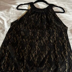 Women’s black, lacy halter like top. L